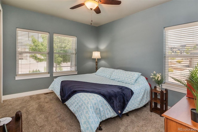 1177 Man O War Way, Colorado Springs, CO 80921 - bedroom with light carpet and a ceiling fan