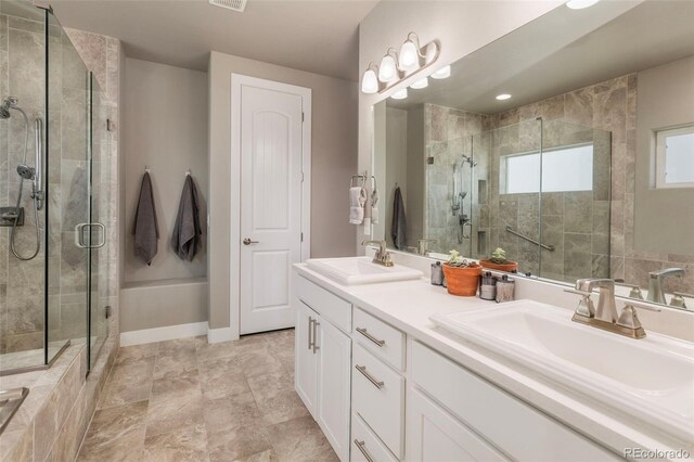 1177 Man O War Way, Colorado Springs, CO 80921 - full bath with a shower stall and double vanity