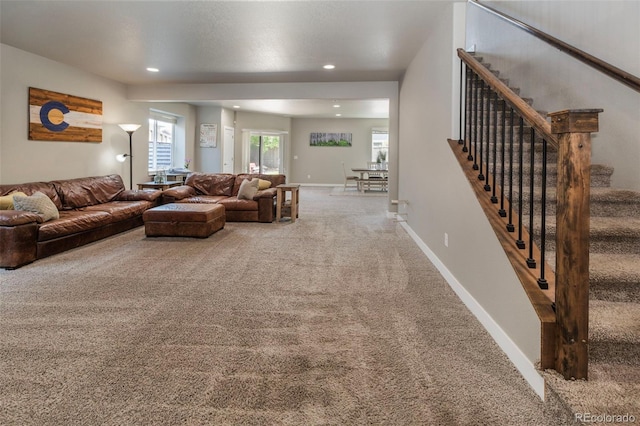 1177 Man O War Way, Colorado Springs, CO 80921 - living room featuring carpet flooring, recessed lighting, and stairs