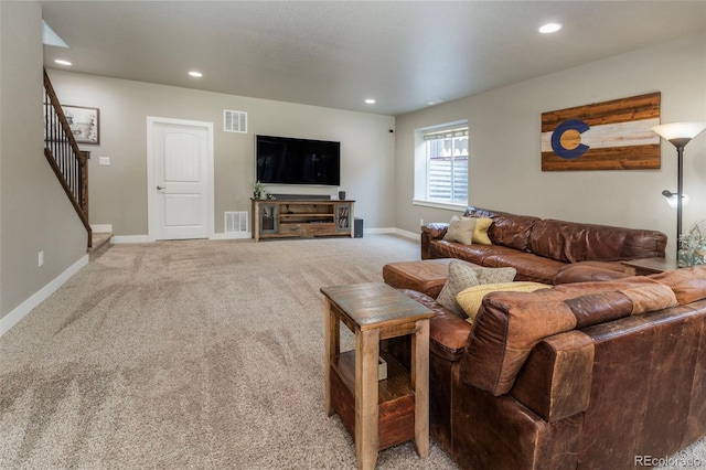 1177 Man O War Way, Colorado Springs, CO 80921 - living area featuring stairway, light carpet, and recessed lighting