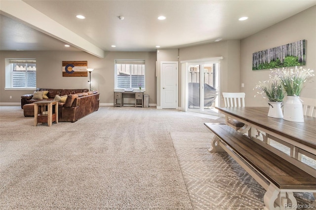 1177 Man O War Way, Colorado Springs, CO 80921 - living room featuring recessed lighting, healthy amount of natural light, and light colored carpet