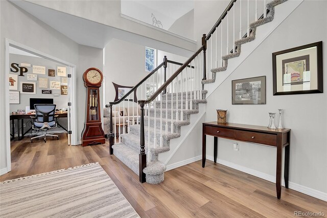 10822 Eagle Crest Ct, Parker, CO 80138 - stairway with wood finished floors and baseboards