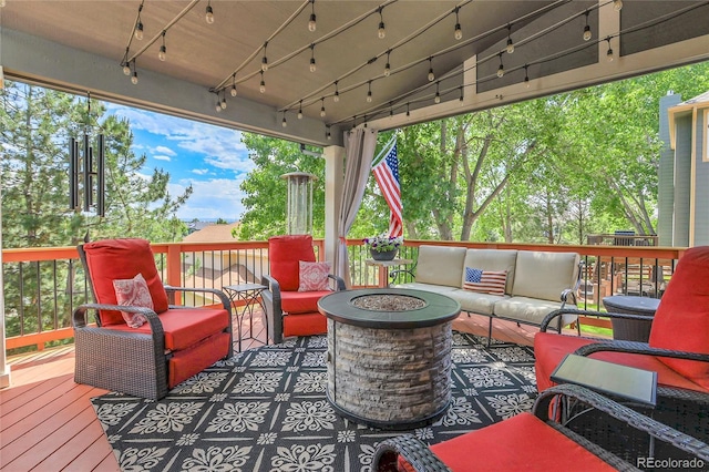 10822 Eagle Crest Ct, Parker, CO 80138 - deck featuring an outdoor living space with a fire pit