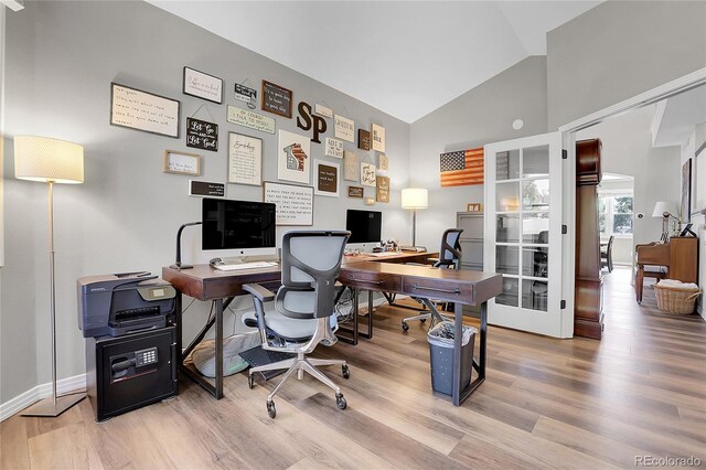 10822 Eagle Crest Ct, Parker, CO 80138 - office area featuring wood finished floors and high vaulted ceiling
