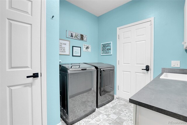 10822 Eagle Crest Ct, Parker, CO 80138 - laundry area featuring separate washer and dryer and cabinet space