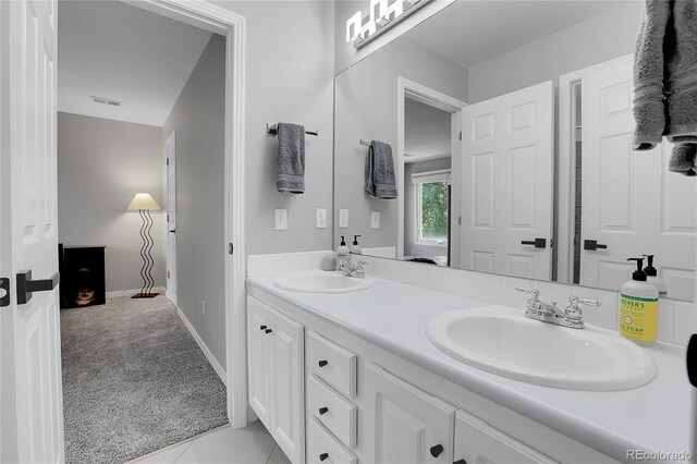 10822 Eagle Crest Ct, Parker, CO 80138 - full bathroom featuring double vanity and baseboards