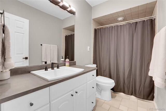 10822 Eagle Crest Ct, Parker, CO 80138 - full bath with vanity, tile patterned floors, and a shower with shower curtain