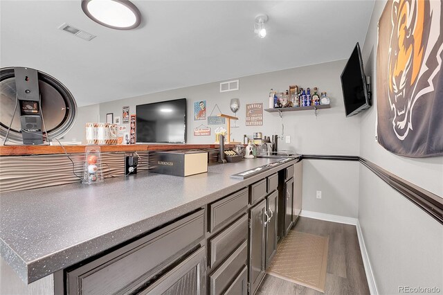 10822 Eagle Crest Ct, Parker, CO 80138 - bar featuring wood finished floors and baseboards