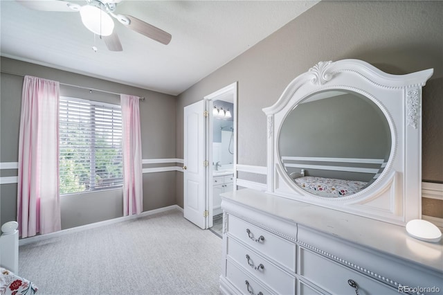 13152 E 104th Dr, Commerce City, CO 80022 - bedroom with light carpet, connected bathroom, ceiling fan, and lofted ceiling