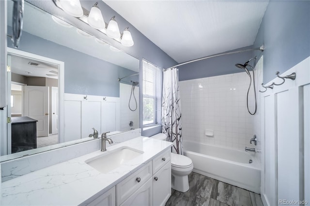 13152 E 104th Dr, Commerce City, CO 80022 - full bath with shower / tub combo, vanity, and wood finished floors