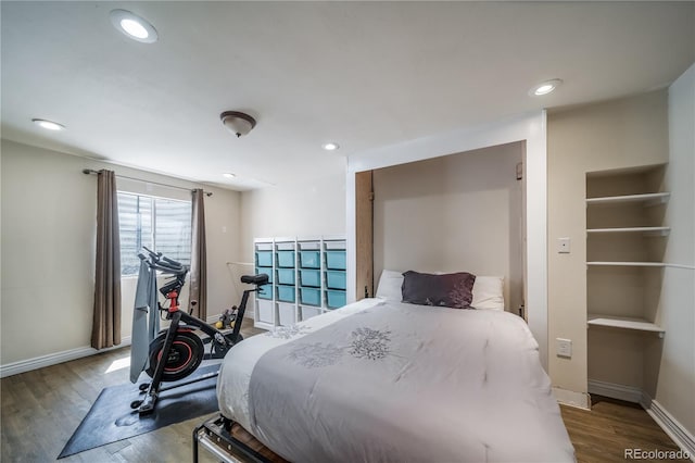 13152 E 104th Dr, Commerce City, CO 80022 - bedroom featuring wood finished floors and recessed lighting