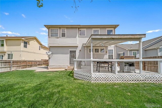 13152 E 104th Dr, Commerce City, CO 80022 - back of house with a fenced backyard and a patio