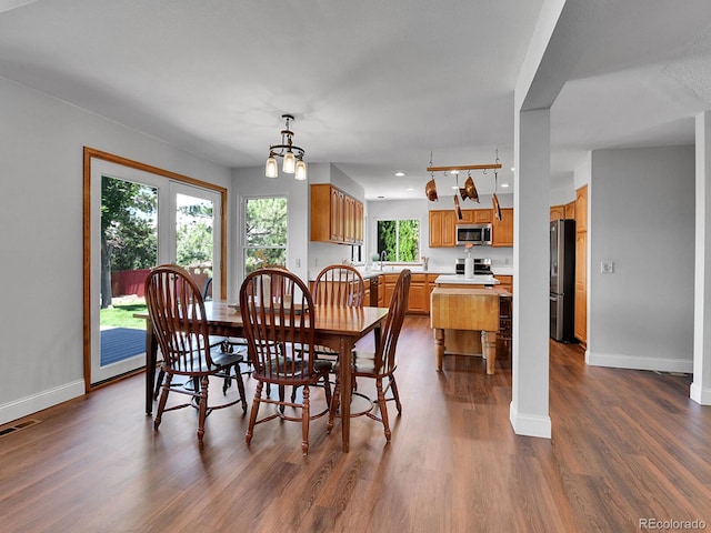 2145 Wynterbrook Dr, Highlands Ranch, CO 80126 - dining room featuring dark wood-style floors and recessed lighting