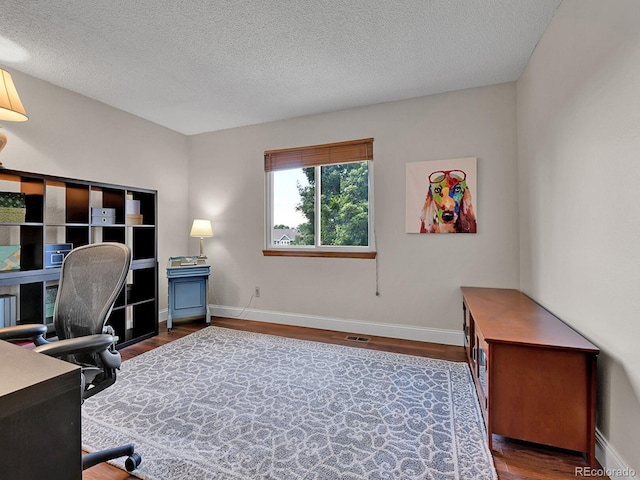2145 Wynterbrook Dr, Highlands Ranch, CO 80126 - office space with wood finished floors and a textured ceiling