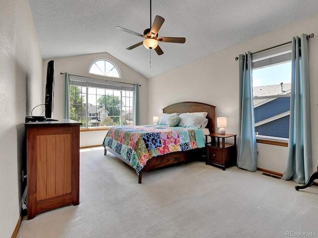 2145 Wynterbrook Dr, Highlands Ranch, CO 80126 - bedroom featuring lofted ceiling, light carpet, a ceiling fan, and a textured ceiling