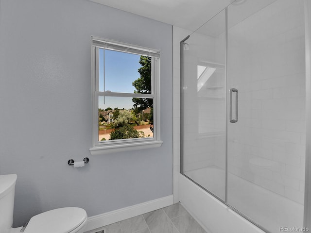 2145 Wynterbrook Dr, Highlands Ranch, CO 80126 - bathroom featuring toilet and enclosed tub / shower combo