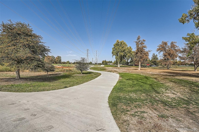 surrounding community featuring a lawn