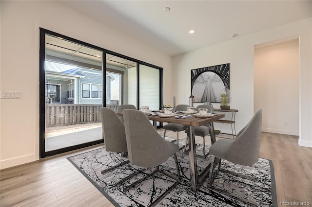 dining room featuring light hardwood / wood-style floors