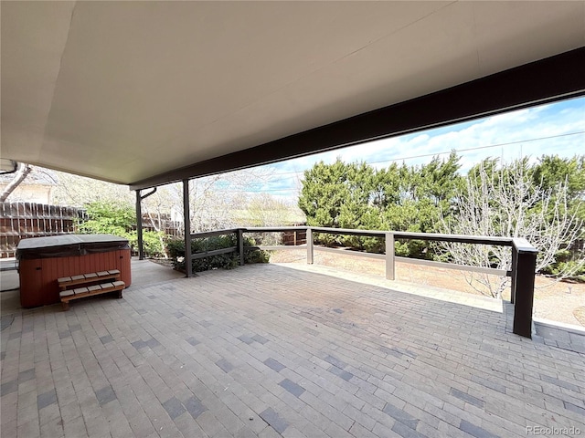 9705 W Dakota Ave, Lakewood, CO 80226 - view of patio / terrace featuring a hot tub