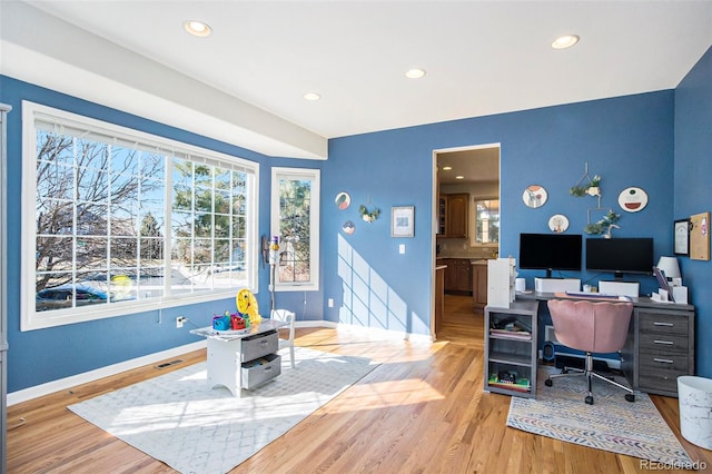 office area featuring recessed lighting, visible vents, baseboards, and wood finished floors