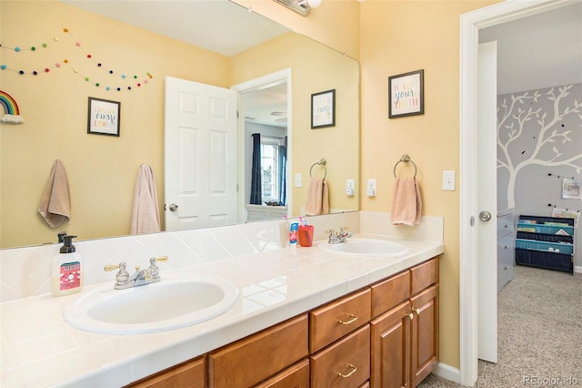 full bath featuring double vanity and a sink