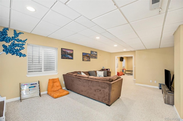 carpeted living area featuring recessed lighting, a drop ceiling, visible vents, and baseboards