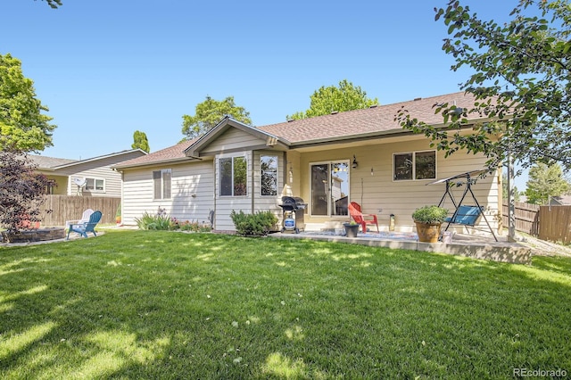 3143 50th Avenue Ct, Greeley, CO 80634 - rear view of property with a patio area and roof with shingles