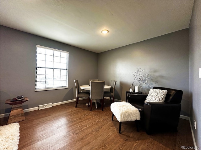 10753 Routt Ct, Broomfield, CO 80021 - dining room with baseboards, wood finished floors, and visible vents