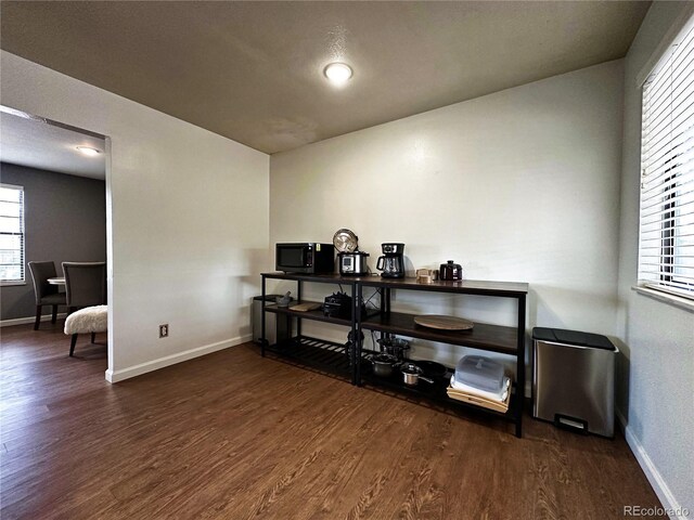 10753 Routt Ct, Broomfield, CO 80021 - interior space with wood finished floors, baseboards, and plenty of natural light