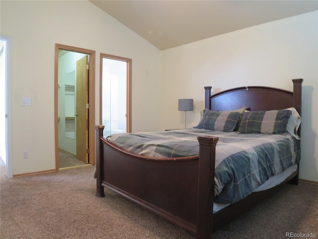 bedroom featuring vaulted ceiling, baseboards, and carpet