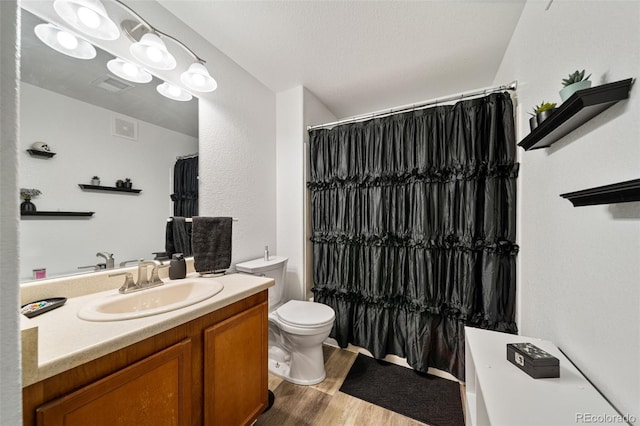 10787 Twenty Mile Rd Unit 205, Parker, CO 80134 - full bath with toilet, vanity, wood finished floors, and a shower with shower curtain