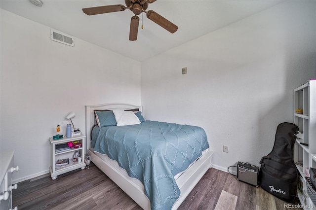 10787 Twenty Mile Rd Unit 205, Parker, CO 80134 - bedroom with wood finished floors, ceiling fan, and baseboards