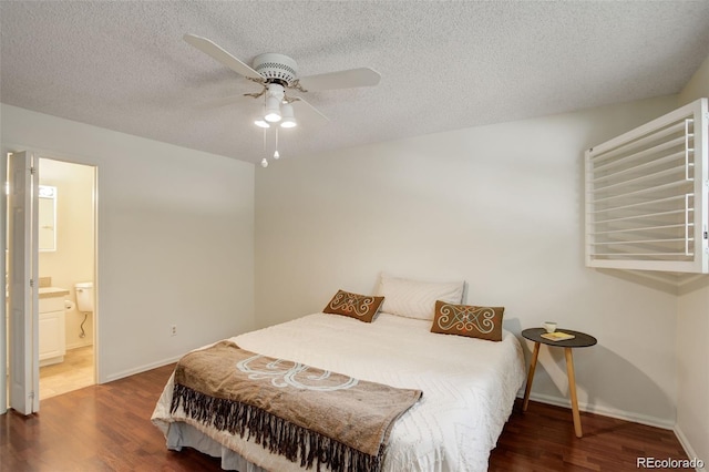 10883 Otis Cir, Westminster, CO 80020 - bedroom featuring wood finished floors, a textured ceiling, ensuite bath, and a ceiling fan