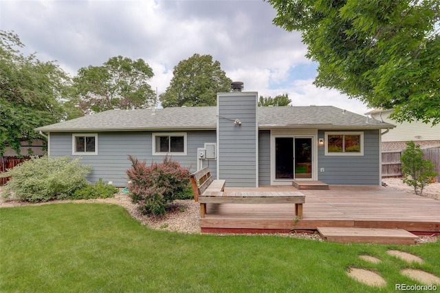 10883 Otis Cir, Westminster, CO 80020 - rear view of property featuring a deck, a chimney, and a shingled roof