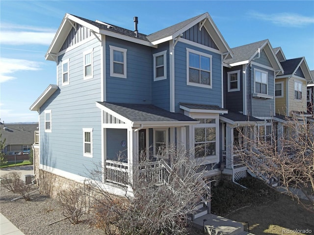 1544 Cottonwood Ave, Lafayette, CO 80026 - exterior space with board and batten siding and a shingled roof