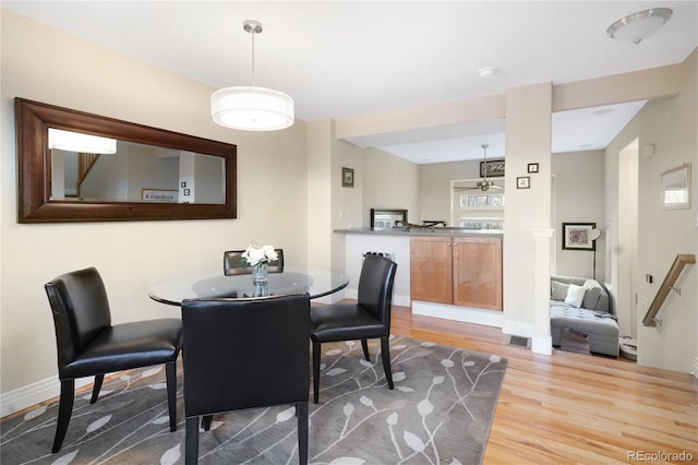 1544 Cottonwood Ave, Lafayette, CO 80026 - dining area with visible vents, wood finished floors, and baseboards