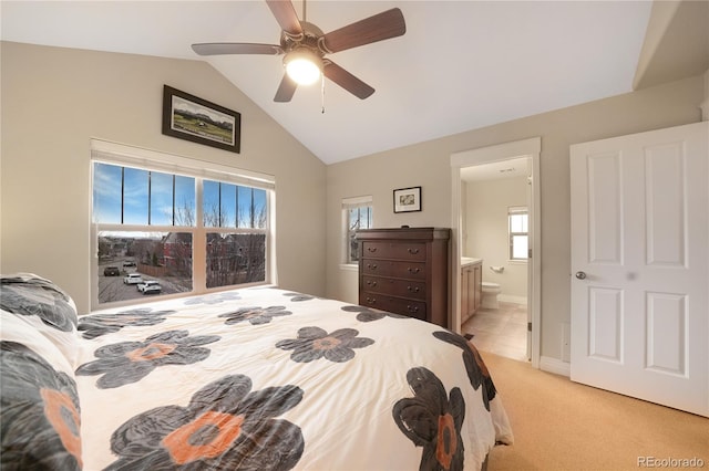 1544 Cottonwood Ave, Lafayette, CO 80026 - bedroom with lofted ceiling, ensuite bathroom, baseboards, light colored carpet, and ceiling fan