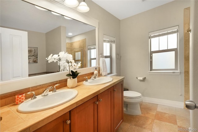1544 Cottonwood Ave, Lafayette, CO 80026 - bathroom with a sink, toilet, double vanity, and a shower stall