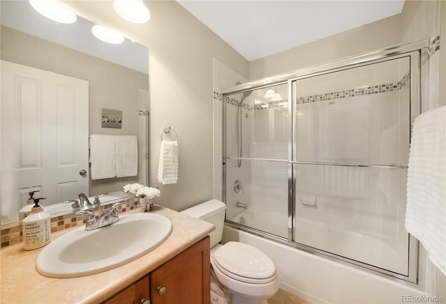 1544 Cottonwood Ave, Lafayette, CO 80026 - full bathroom featuring toilet, vanity, and shower / bath combination with glass door