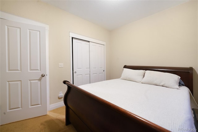 1544 Cottonwood Ave, Lafayette, CO 80026 - bedroom featuring light colored carpet, a closet, and baseboards
