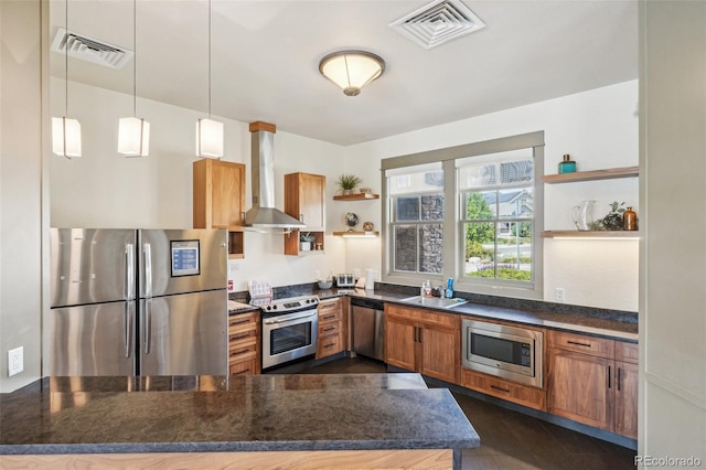 19733 W 93rd Ln Unit A, Arvada, CO 80007 - kitchen featuring appliances with stainless steel finishes, open shelves, wall chimney exhaust hood, a sink, and brown cabinetry