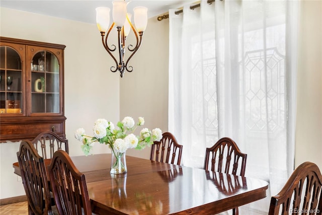 5503 W Colorado Ave, Lakewood, CO 80232 - dining area featuring an inviting chandelier