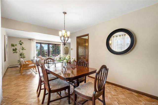 5503 W Colorado Ave, Lakewood, CO 80232 - dining area with baseboards, baseboard heating, and a notable chandelier