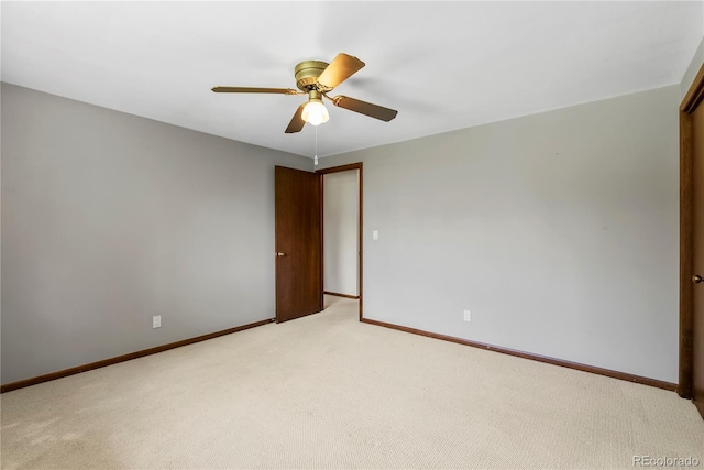 5503 W Colorado Ave, Lakewood, CO 80232 - spare room featuring baseboards, ceiling fan, and light colored carpet