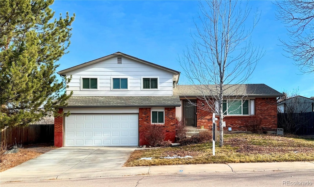 view of front of property featuring a garage