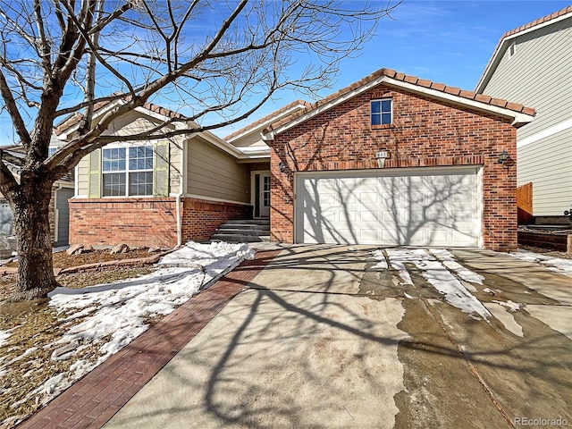 view of front of property with a garage