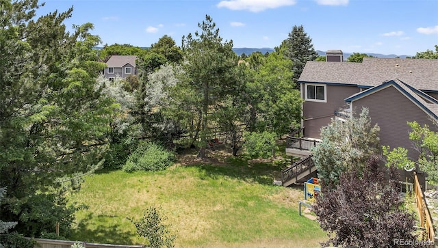 4386 W Deertrail Ct, Castle Rock, CO 80109 - view of yard with stairway and a wooden deck