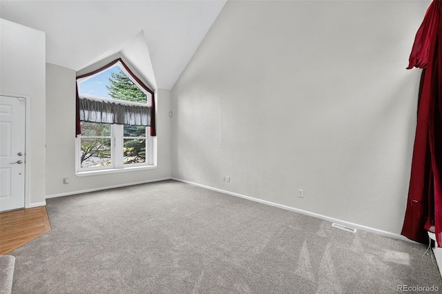 4386 W Deertrail Ct, Castle Rock, CO 80109 - unfurnished living room with carpet flooring and vaulted ceiling