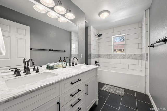 full bath featuring double vanity, shower / bathing tub combination, a sink, and tile patterned floors