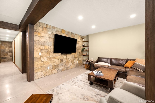 living area featuring beam ceiling, recessed lighting, and tile patterned floors